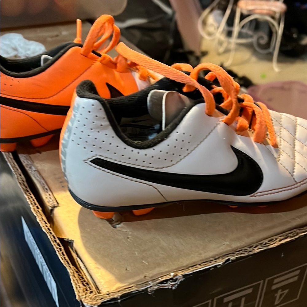 Nike White and Orange Sneakers Sleek Modern Design